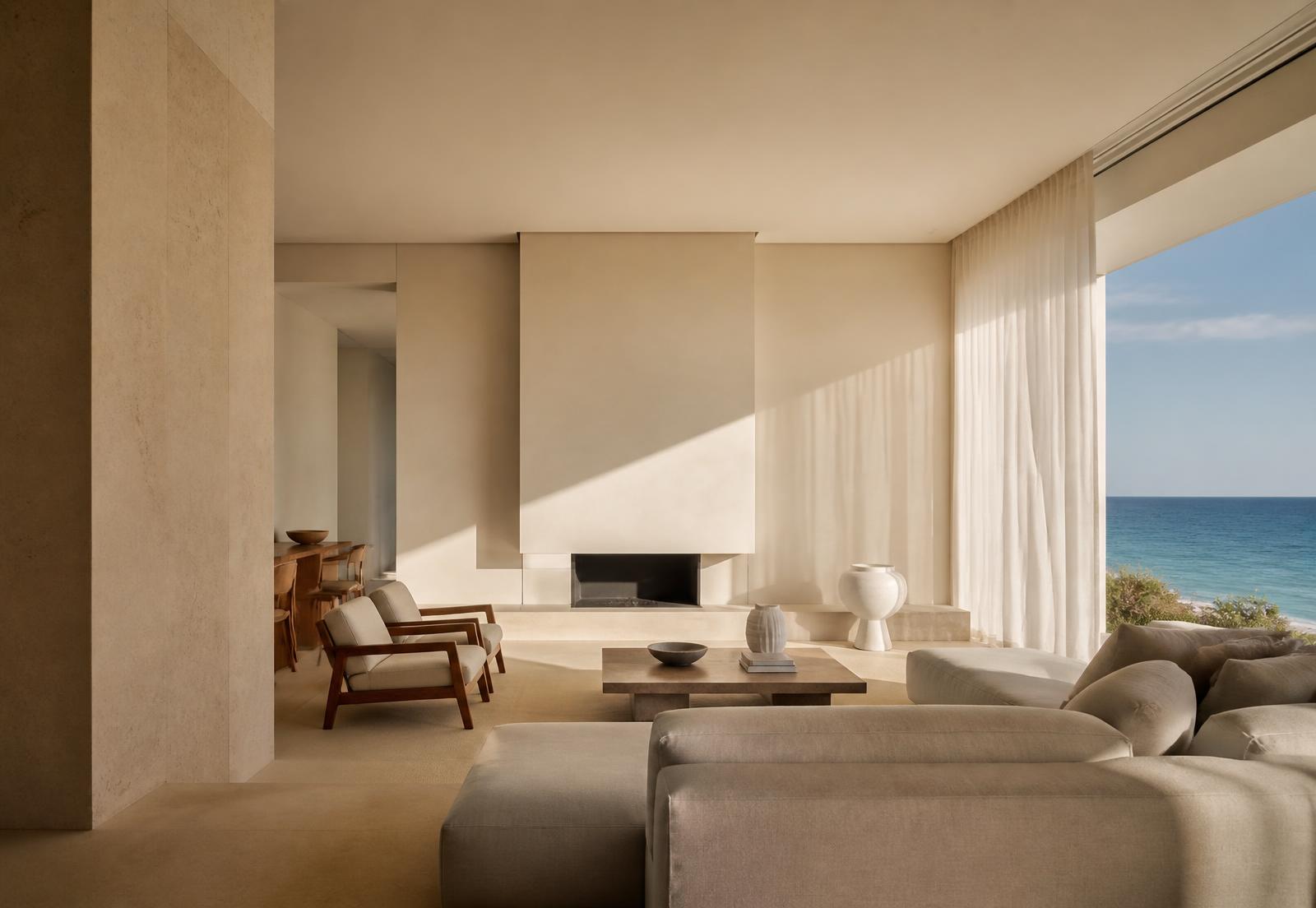 Sala de estar minimalista com luz natural e vista para o mar